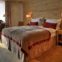 Отель Le Petit Cervin Церматт Экстерьер фото A bed